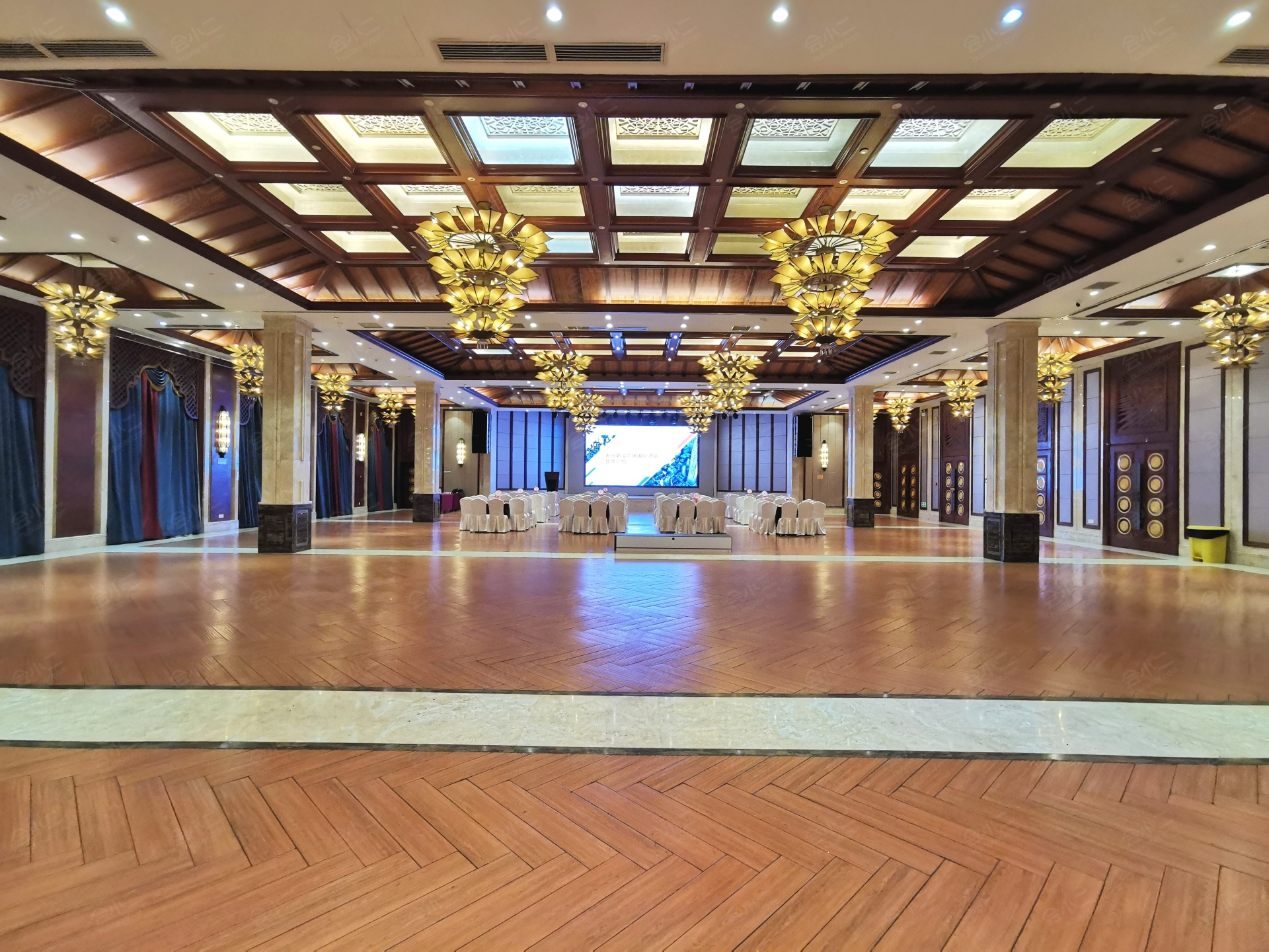 View across the conference hall towards the presentation stage